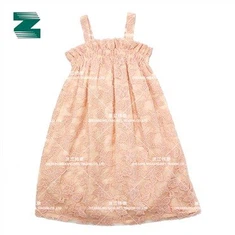 Vestit per a nens en teixit d'encaix amb folre